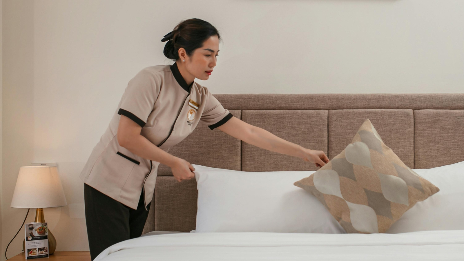Caregiver assisting with light housework and home organization